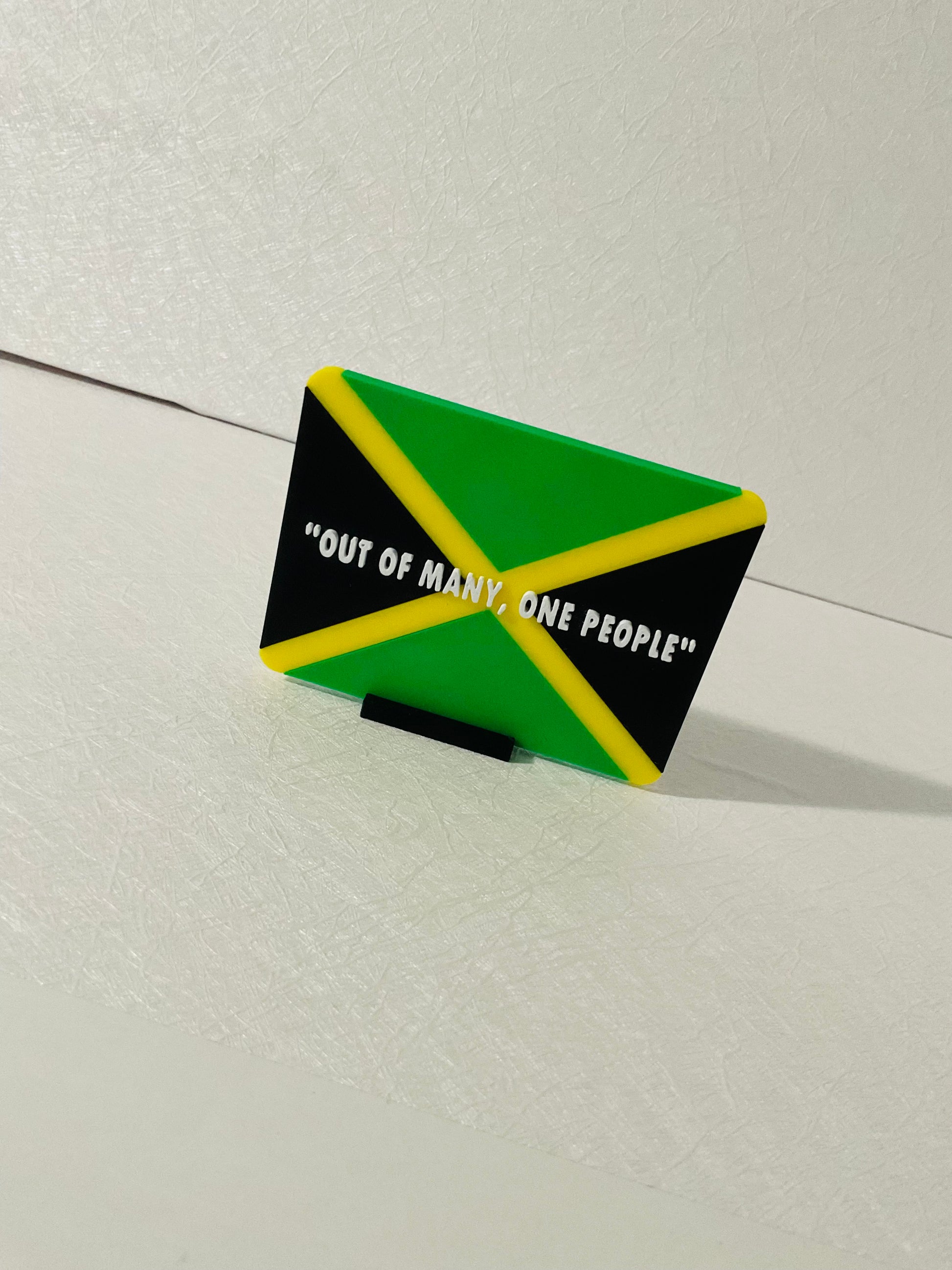 Out Of Many, One People Jamaican Sign With Stand 
