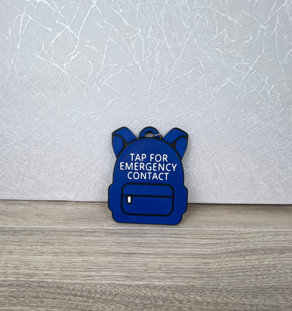 customizable 3D printed backpack NFC emergency tag! Designed in the shape of a cute backpack, this tag allows anyone to simply tap their phone to the tag to access a pre-programmed emergency contact.