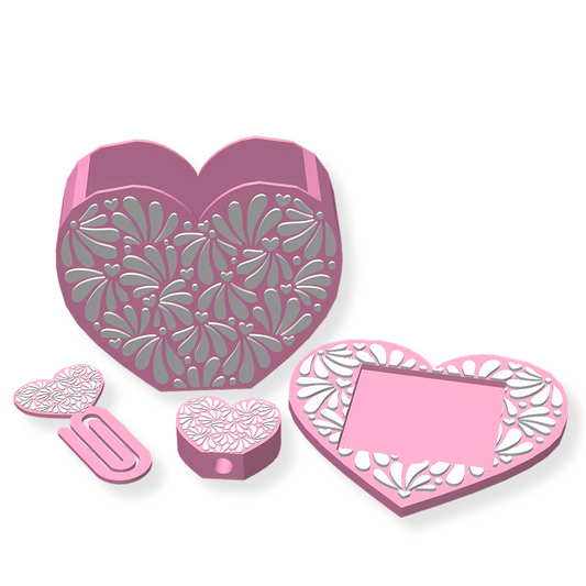 pink and white 3d printed talavera pattern heart shaped desk set including a pen holder, sticky note pad holder, straw topper and a jumbo paper clip.